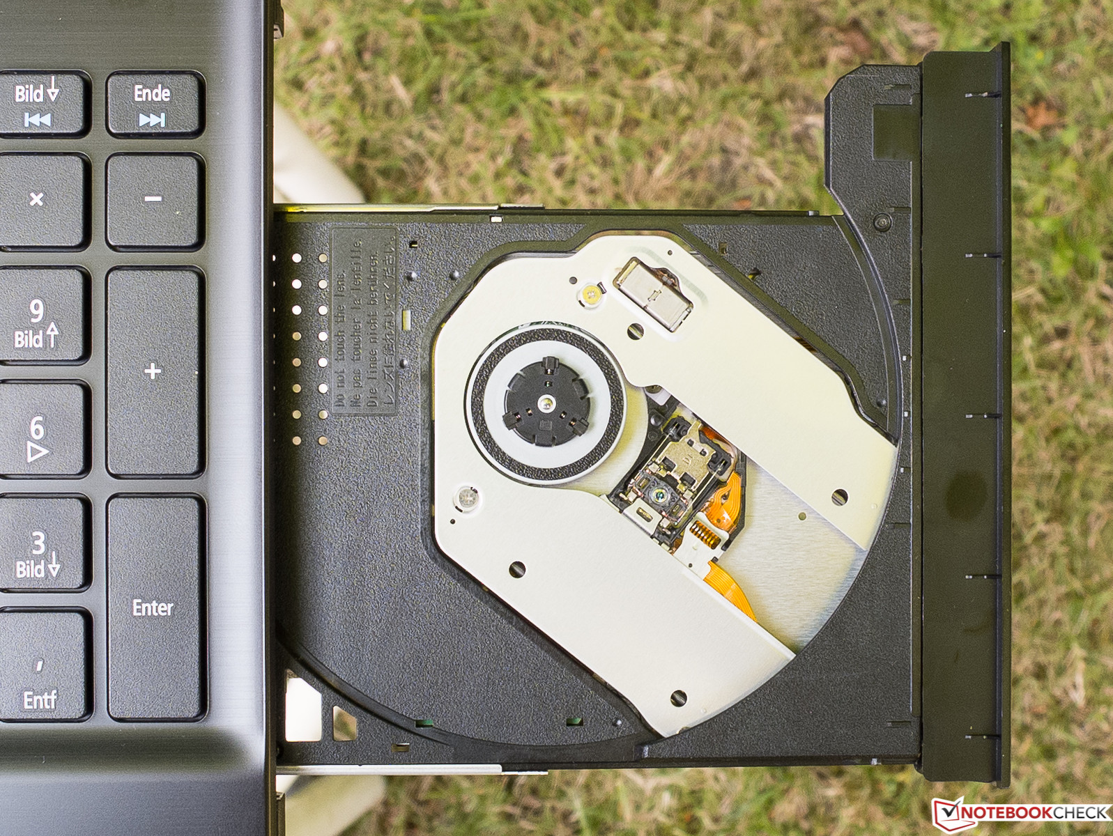 how to open dvd drive on acer laptop