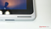Speakers are located at bottom left and right of tablet.