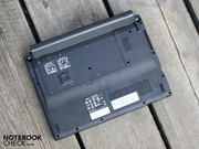 It has rubber feet which raise the back end of the laptop.