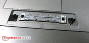 The port for the docking station Toshiba Hi-Speed Port Replicator II on the bottom.