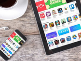Apple App Store loaded on iPhone and iPad tablet