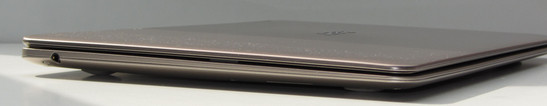 A combination audio jack is on the right