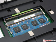 A cover on the bottom leads to both RAM slots (2 GB module).