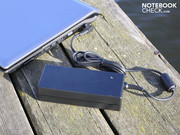 The heavy 120 watt adapter supplies the laptop