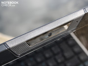 For example the rubberized area around the webcam provides grip when you open the laptop.