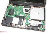 The upper tray has to be removed before accessing the hardware.