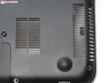 As can be seen through the opening, a large heat sink is used rather than a fan.