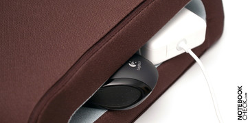 The inside has room for an AC adapter as well as a small USB mouse.