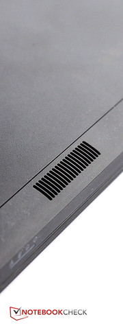 The speakers are on the underside of the computer.