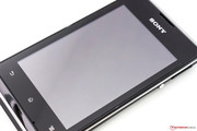 Sony equips the device with a glossy 3.5 inch display.