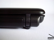 A picture of the rear of the case with the display hinges and battery.