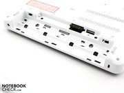 The battery is in the back part of the case