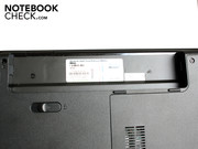 Dell stashes the Windows license away and puts it beneath the battery.
