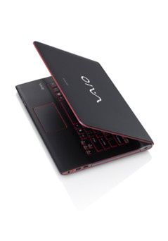 Press release image. Vaio E14P Black model patially open showing red accents.