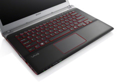 Press release image. Vaio E14P Black model keyboard view showing red accents.