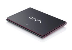 Press release image. Vaio E14P Black model closed top view showing red accents.