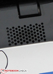 The speakers are located above the keyboard.