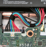 It is connected to the motherboard with a plug.