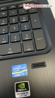 The fingerprint reader is located on the right below the keyboard.