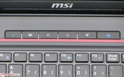 Five additional function buttons are situated next to the power button (on the right).
