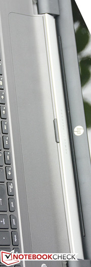 The speakers are above the keyboard.