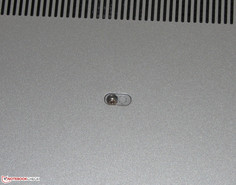 The screw is covered by a sticker.
