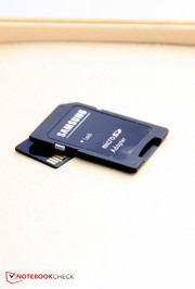 A microSD card and adapter are included.
