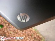 The outer HP logo glows white when the notebook is powered on