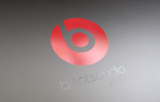 The Beats Audio logo itself is more reflective than the surrounding texture