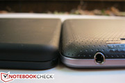 The backside is also rounder and textured compared to the flatness of the Kindle Fire (left)