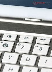 The keyboard features many special keys.