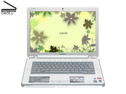 Pure white glossy surfaces combined with a metallic frame and a silver keyboard ...