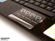 The plain touchpad with a multi-touch instruction sticker