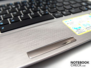 The touchpad is barely visible and can only be made out by its dimpled surface.