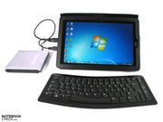 A Bluetooth keyboard is included in the scope of delivery. You'll have to supply an optical drive yourself.
