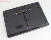 The bottom of the laptop is fitted with a large maintenance flap,...
