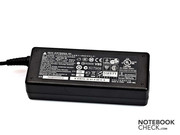 The power supply of the Asus A52JU is quite small and light.