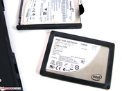 Standardly, only SSDs and hard drives with 7mm height fit