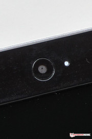 The webcam features a status LED.