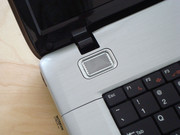 The two small loudspeakers are positioned above the keyboard to the left and right.
