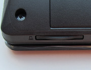The memory card reader is protected from contamination by a dummy.