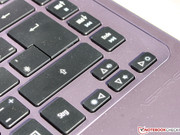 The keyboard flexes above the optical drive.