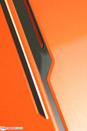 Slight checkerboard pattern can be seen below the glossy finish