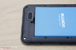 Monaural speaker on back of smartphone Monaural speaker on back of smartphone