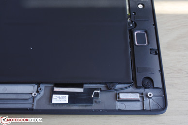 Stereo speakers facing downwards adjacent to the battery Stereo speakers facing downwards adjacent to the battery
