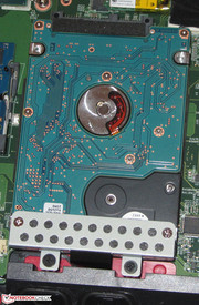 A traditional hard drive provides data storage.
