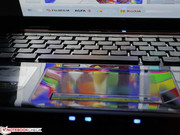 The high-gloss finish does not stop even before the wrist rest.