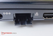 The partial cover of the RJ-45 port folds down to make room for the cable.