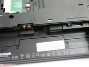 The SIM slot is located inside the battery bay.