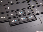 Screen brightness and volume are controlled via arrow keys